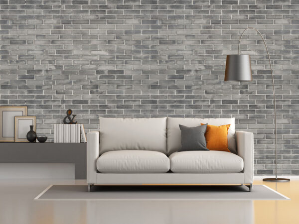 Grey brick wall texture background. Tiled.