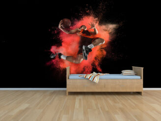 Basketball player flying through the air with red splash behind, black background, mockup