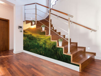 Flowerpots situated on wooden stairs in luxury home